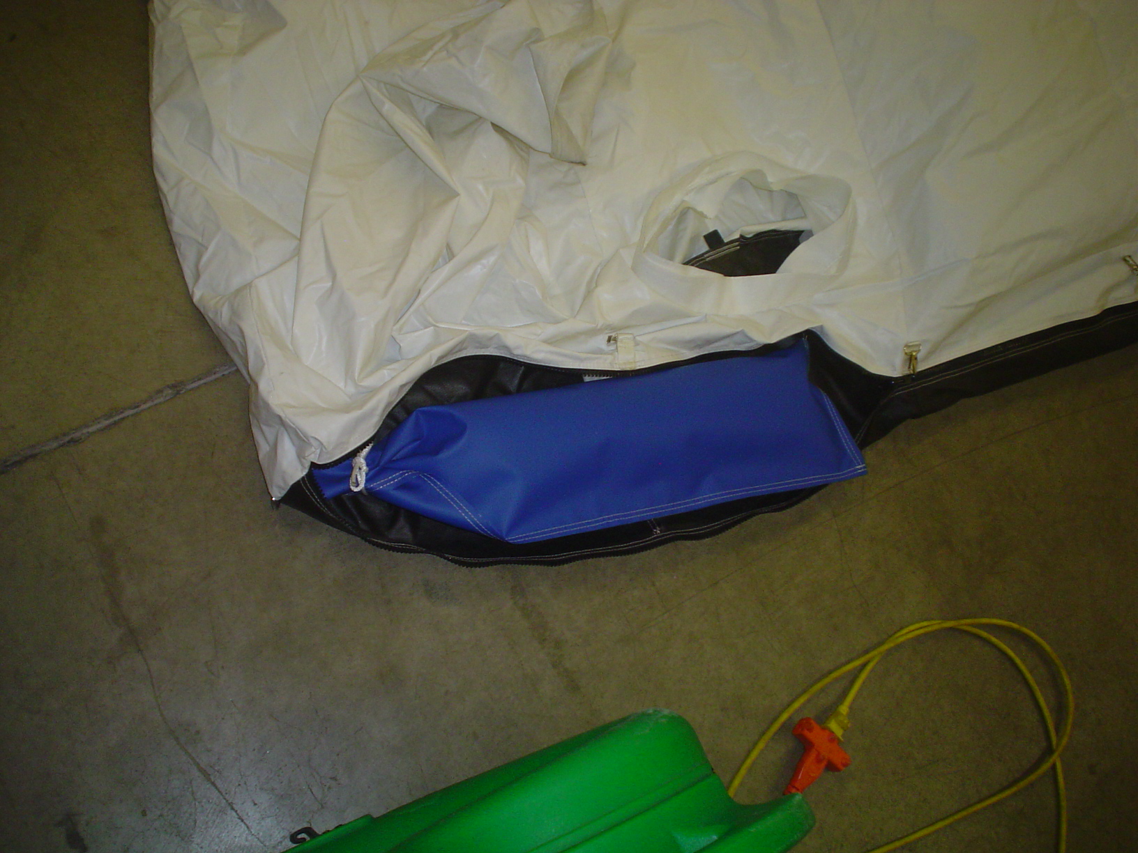 Sandbag inside inflatable shelter